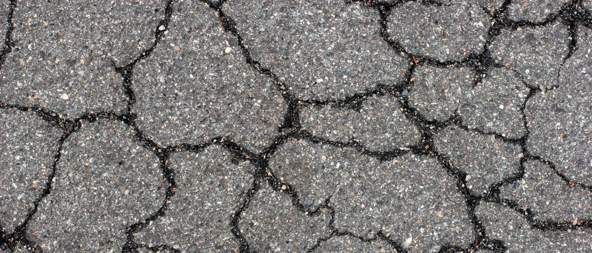 Closeup of weathered asphalt.