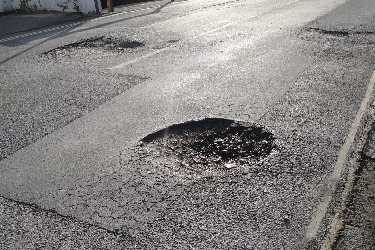 You are currently viewing How Potholes Affect Your Vehicle